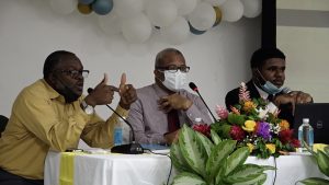 Seated at the head table (l-r) Mr. Denzil Stanley, Principal Assistant Secretary in the Ministry of Communication and Works; Hon. Spencer Brand, Minister of Physical Planning; and Mr. De-Jono Liburd, Legal Counsel at the Legal Department at a consultation for contractors hosted by the Department of Physical Planning at the St. Paul's Anglican Church Hall on September 07, 2021