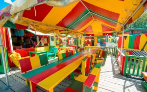 Sunshine’s Beach Bar on Pinneys Beach as it appears in a feature article on Nevis in the Canada-based Travel Courier magazine’s October 14, 2021 edition