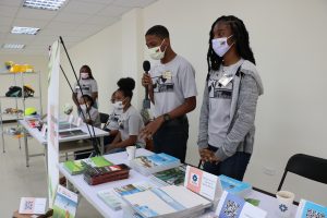 Some of the eleven students on Nevis hired by Taiwan’s Trade Development Council to introduce products on behalf of Taiwanese business people at the Taiwan Expo in St. Kitts and Nevis at the Malcolm Guishard Recreational Park at Pinney’s on December 20, 2021