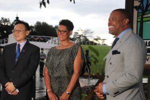 (L-r) Resident Ambassador of the Republic of China (Taiwan) to St. Kitts and Nevis His Excellency Michael Lin; Mrs. Yvonne Guishard, widow of the late Hon. Malcolm Guishard; and Hon. Mark Brantley, Premier of Nevis share a light moment moments after Mrs. Guishard unveiled the welcome sign at the Malcolm Guishard Recreational Park on December 19, 2021