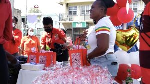 Patrons at the Nevis Health Promotion Unit’s safe sex promotion at the War Memorial in Charlestown on Valentine’s Day, February 14, 2022