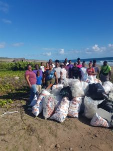 Volunteers after cleaning in the St. George's Parish in February during a month-long clean-up exercise funded and organised by Hon. Eric Evelyn, Area Representative 