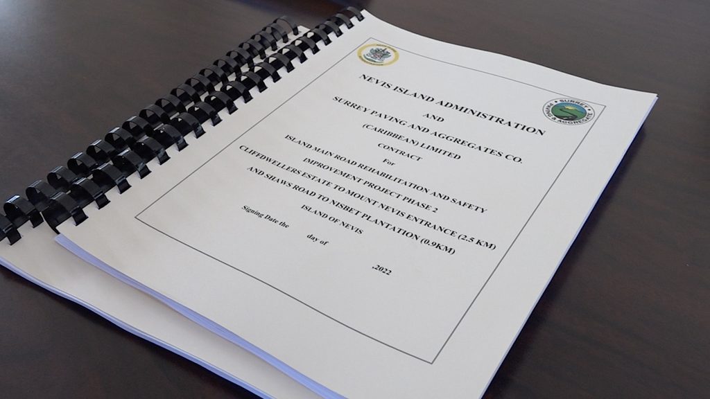 The contract for Island Main Road Rehabilitation and Safety Improvement Project Phase 2 signed on behalf of the Nevis Island Administration by Dr. Ernie Stapleton, Permanent Secretary in the Ministry of Communications and Works; and Mr. Michael Morrison, Project Manager, and Ms. Xia-Xiang Claxton, Quality Engineer, on behalf of Surrey Paving & Aggregate Company Caribbean Ltd.
